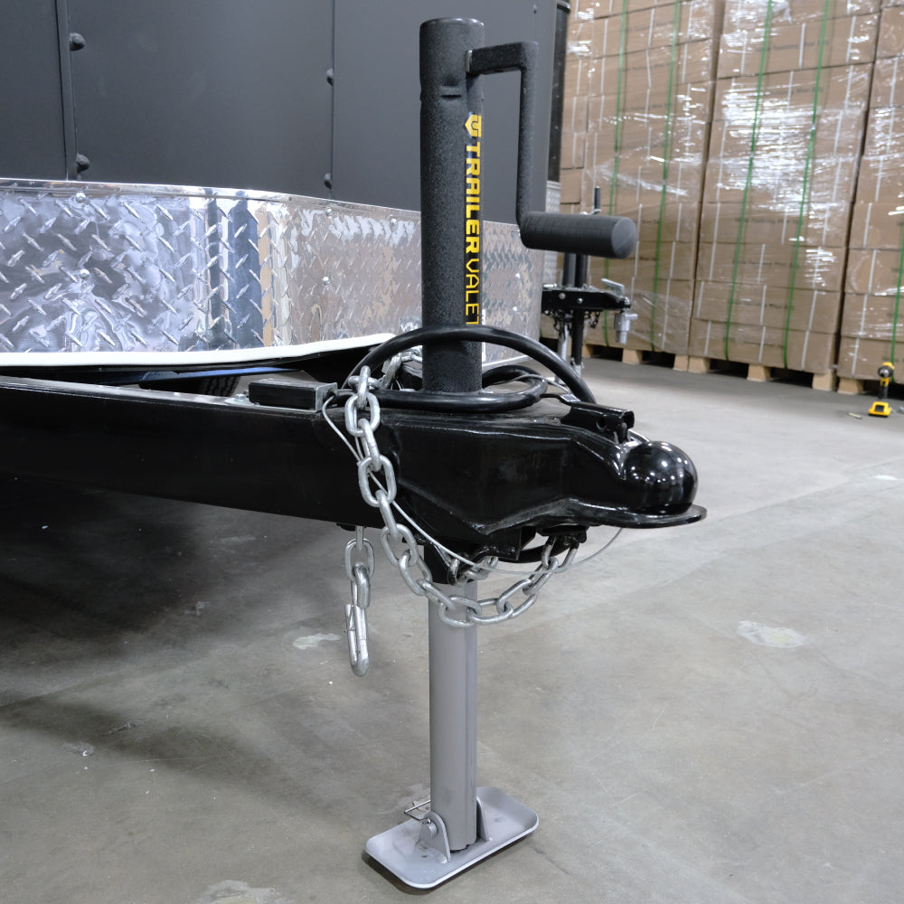 Lifestyle image showing JX 2K center jack mounted to trailer in outdoor setting - REFTVJX2-C