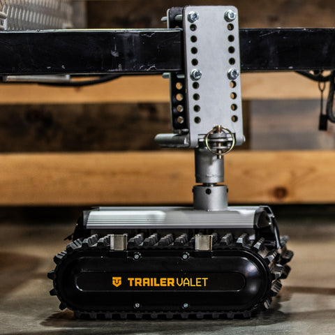 RVR3 lifestyle image guiding a trailer in a driveway - TVRVR3